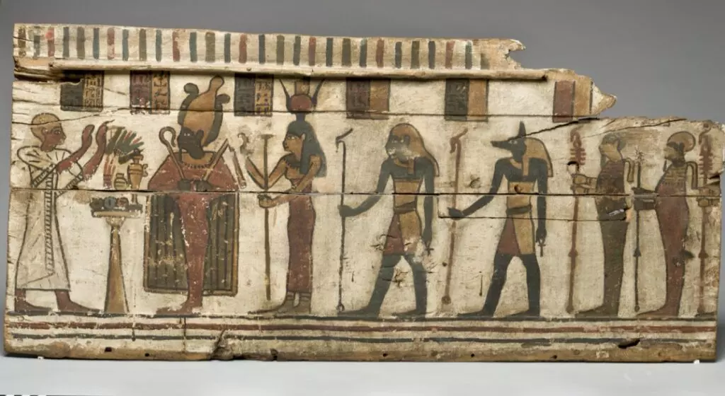 Fragment of a painted wooden mummy coffin
